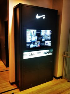 Photograph of Nike store with Fuelband Product Displays and Graphics